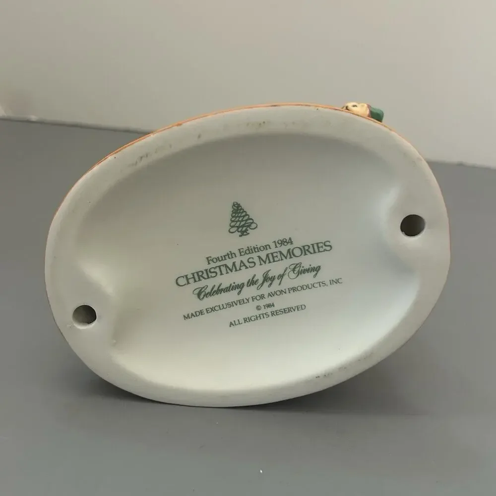 1984 Avon Christmas Memories Series Celebrating Joy Giving Porcelain Figurine
